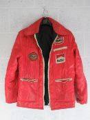 An original 1970s James Hunt style red anorak with Gulf and Marlboro and Texaco sewn in cloth