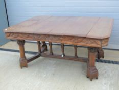 Arts and Crafts Extending Oak dining Table: an oak table possibly designed by Philip Webb,