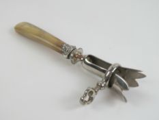 A late 19th / early 20th century French silver plate and horn manche a gigot (ham bone holder) with