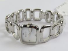 An 'as new' Gucci wristwatch having mother of pearl dial and Swiss movement,