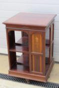 Art Nouveau: an inlaid Revolving Bookcase in the manner of Shapland and Petter, Barnstaple.