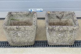 A good pair of pre-cast concrete planters, each measuring 37 x 37cm.
