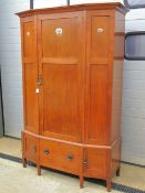 EA Taylor Arts and Crafts: a fruitwood wardrobe with inlaid Abalone,