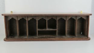 A Regency and later set of wall mounted pigeon holes: a mahogany,