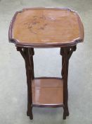 French Art Nouveau: in the manner of Jaques Majorelle (1886-1962) an inlaid two tier side table