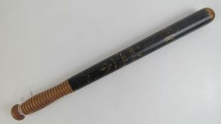 A Victorian truncheon having black ground with VR cypher and Special Constable under,