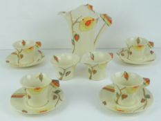 A Clarice Cliff Bizarre 'Yellow Rose' pattern coffee service,