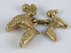 A 9ct gold charm being large and small Poodle, each hallmarked, total weight 10.8g.