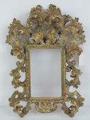 Florentine gilt cabinet portrait frame: an 18/19th century carved wooden and gilded frame with