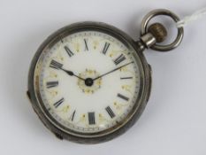 A hallmarked silver fob watch having white enamel dial with gilt decoration,