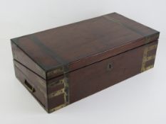 An impressive and heavy mahogany writing slope,