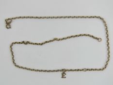 A vintage 9ct gold chain necklace with E charm upon, stamped 9c, 3.6g.