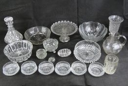 A quantity of assorted vintage pressed glassware including bowls, decanter, celery jar, etc.