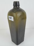 A 19th century square shaped tapering 'gin' bottle,