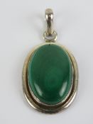 A large silver and malachite cabachon pendant, stone measuring 25 x 16mm, bale marked 925,