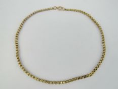 A vintage 9ct gold faceted belcher link chain necklace, indistinctly stamped 9ct to clasp,