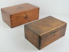 Two vintage lidded work boxes, on in oak 25cm wide, one in pine 31cm wide. a/f.