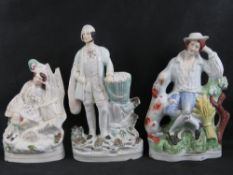 Staffordshire flatbacks; three assorted figurines ranging in size 26 - 35cm, a/f.