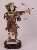 A Japanese archer figure carved from a Woolly Mammoth tusk segment (Extinct Genus Mammuthus