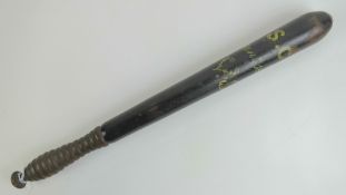 A Victorian truncheon having black ground with SC (special Constable) upon 'Jan 1868' with VR