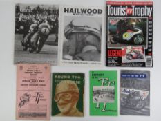 A 1957 TT Mountain Course Official Scorecard together with a quantity of vintage TT race