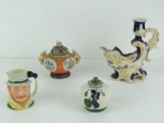 A delightful part gilded Continental ceramic chamber stick,