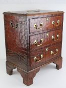A delightful crocodile skin covered small chest of three drawers,