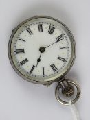 A hallmarked silver fob watch having white enamel dial with gilded dots,