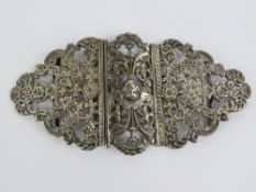 A late Victorian HM silver belt buckle of floral form having central cherub head and wings,