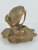 Victorian desk stand: a cast brass inkstand / standish formed as a young egret perched on a rolled
