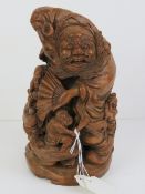 A carved bamboo figure of Zhong Kui myth