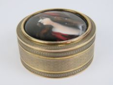 A Continental gilded white metal and ena