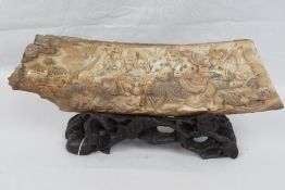 A carved segment of Woolly Mammoth tusk