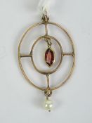 An Edwardian garnet and pearl pendant of