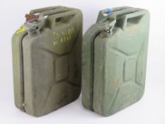 Two 20L 'Jerry' petrol cans each dated 1