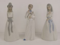 Three Lladro type standing lady figurine