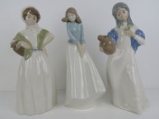 Three large Lladro type standing lady fi