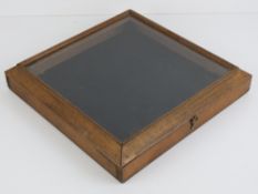 A mahogany framed table top glazed displ