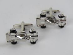 A pair of 'as new' cufflinks in the form