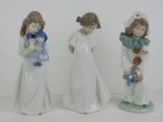 Three Nao figurines each being standing