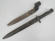 A Siamese Mauser bayonet, together with a WWII British Mk9 bayonet. Two items.