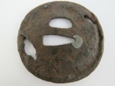 A 16th century Japanese tsuba.