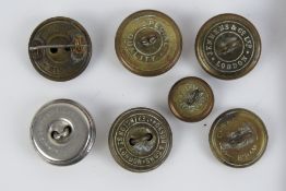 An Irish Guards Swallow Nest epaulette together with an arm patch and seven military buttons being