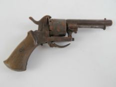 An obsolete calibre pinfire revolver.
