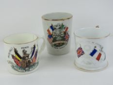 Two 1914-1919 WWI commemorative mugs, together with a British & French alliance commemorative mug.