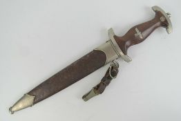 An SA Dagger with scabbard, full Rhom inscribed, makers mark E.P.&.S Solingen.