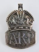 A HM silver ARP lapel badge, hallmarked London 1938.