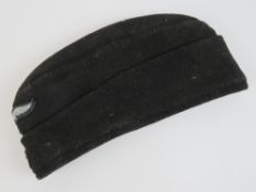 A WWII Lufwaffe Panser Hermann Göring Division side cap in felt complete with cloth badges and