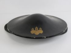 A c1800s Japanese Samurai Kabuto helmet having Prime Minister and Imperial family crest upon.