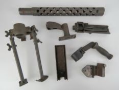 A WWII A6 Browning 30 cal conversion kit, consisting of 7 parts.